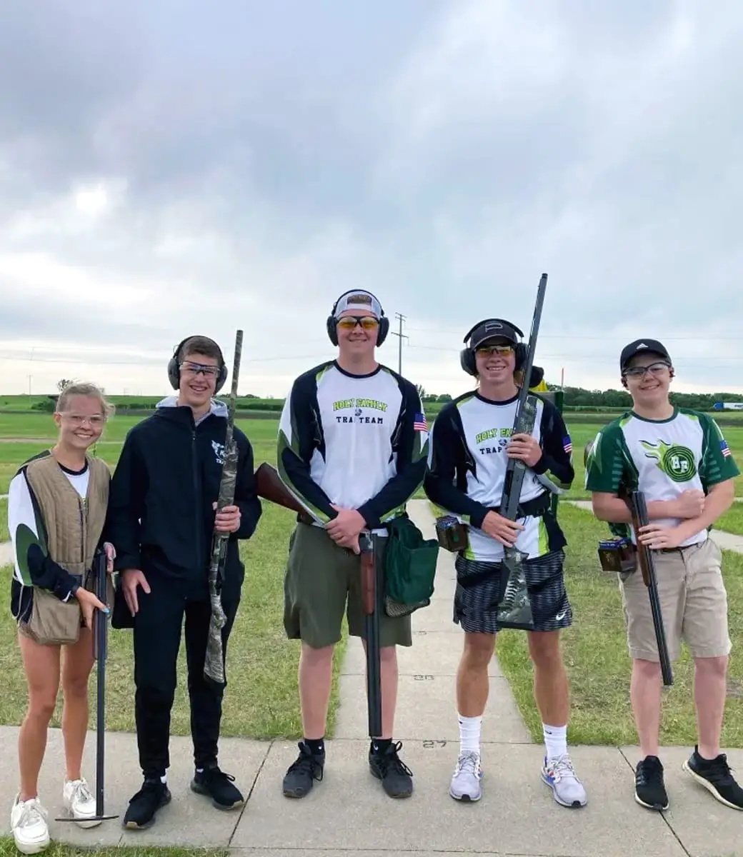 Youth shooting team posing for a photo