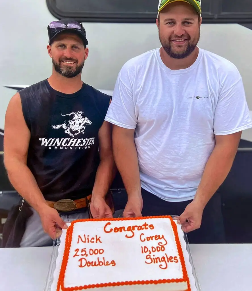Trap shooting league champions celebrate the season with cake